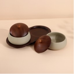 Luxury ceramic serving set with a wooden base Luxury ceramic serving set with a wooden base