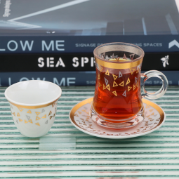 36-piece gold and silver patterned coffee and tea cup set