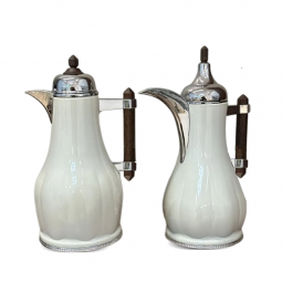 A white, silver, tea and coffee thermos set with a dark brown wooden handle