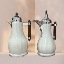 A white, silver, tea and coffee thermos set with a dark brown wooden handle