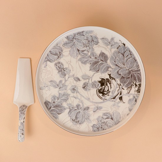 Cake stand with ceramic spoon featuring decorative designs and a silver finish, 11.5 inches in size