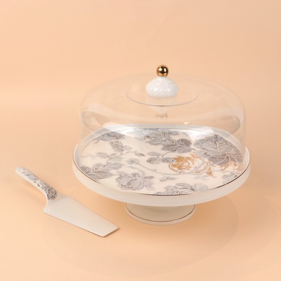 Cake stand with ceramic spoon featuring decorative designs and a silver finish, 11.5 inches in size