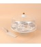 Cake stand with ceramic spoon featuring decorative designs and a silver finish, 11.5 inches in size