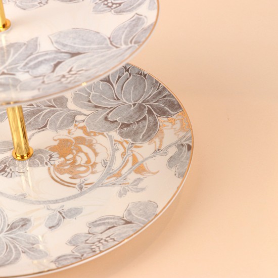 Two-tier dessert serving stand with decorative designs and a silver finish, measuring 10 x 8 inches.