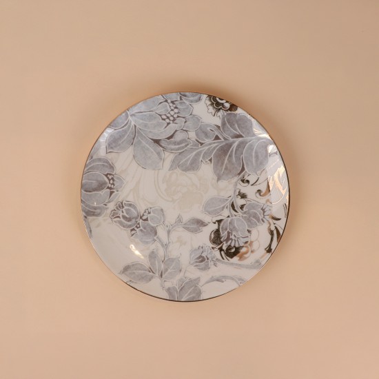 A ceramic serving dish with decorative designs and a silver finish, measuring 20.8 cm x 2.1 cm.