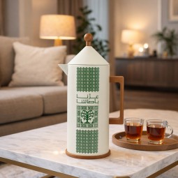 A distinctive heritage-style tea thermos in white and green with the phrase "Our pride lies in our heritage" - 1 liter - 2G1B200108 A distinctive heritage-style tea thermos in white and green with the phrase "Our pride lies in our heritage" - 1 liter - 2G1B200108