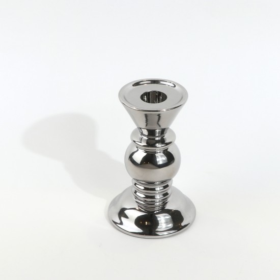 Shiny metal candle holder with a classic, elegant design