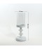 Glass candlestick on an elegant metal base - white
