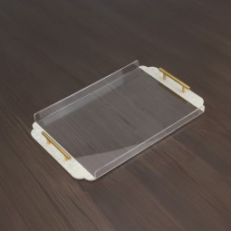 Clear acrylic serving tray with gold handles Clear acrylic serving tray with gold handles