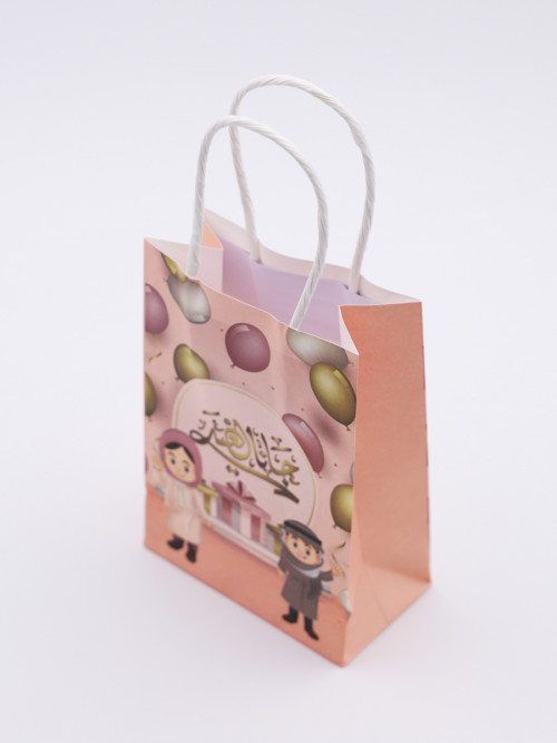 Paper bags with Eid decoration and the words Jana Al Eid 8 pieces