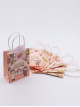 Paper bags with Eid decoration and the words Jana Al Eid 8 pieces