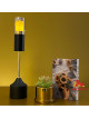 Gold / black candlestick with a round base