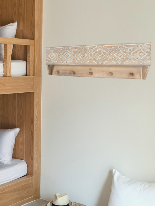 Wooden Shelf Decorated With Wooden Hangings