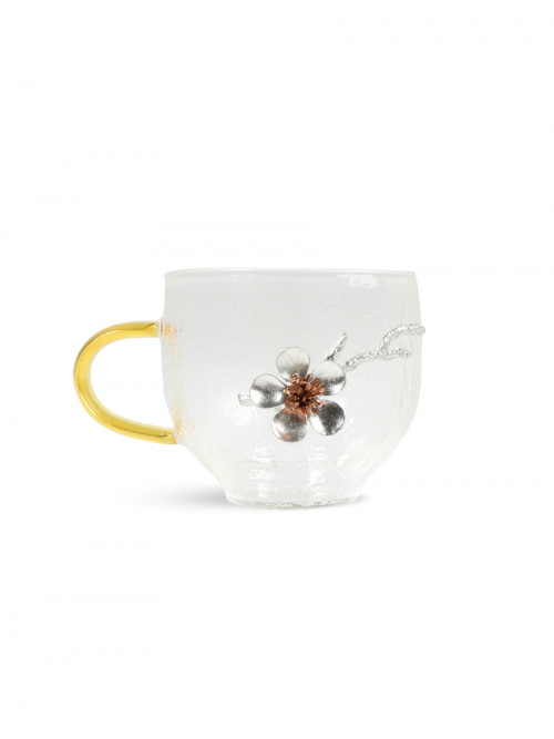 Coffee cup with decorative golden handle