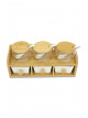 A set of 3 clear glass spice containers with a wooden lid with a stand holder