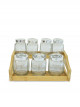 Set of 6 clear glass spice containers with wooden stand