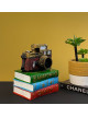 A masterpiece of a camera with decorative books for the beauty of your home