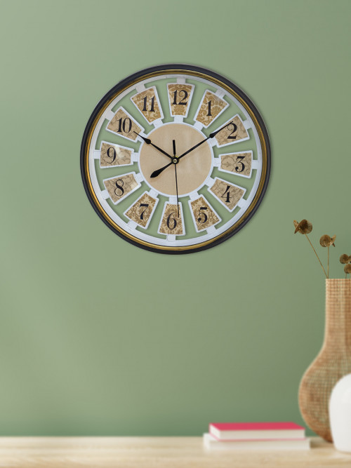 Circular wall clock with a black frame, size 30 cm