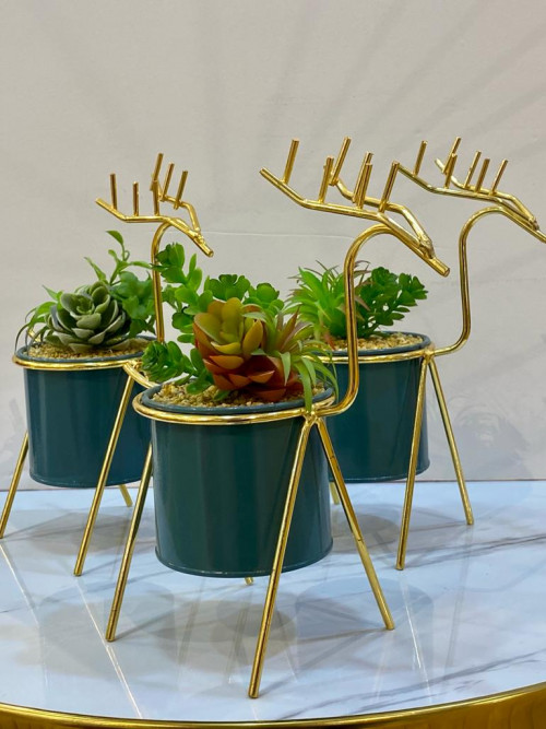 tree with golden deer shape stand