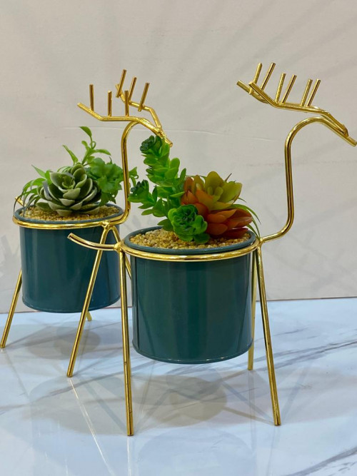 tree with golden deer shape stand