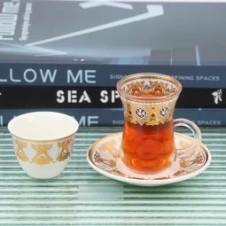 36-piece gold and silver patterned coffee and tea cup set