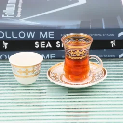 36-piece gold and silver patterned coffee and tea cup set