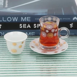 36-piece gold and white patterned coffee and tea cup set